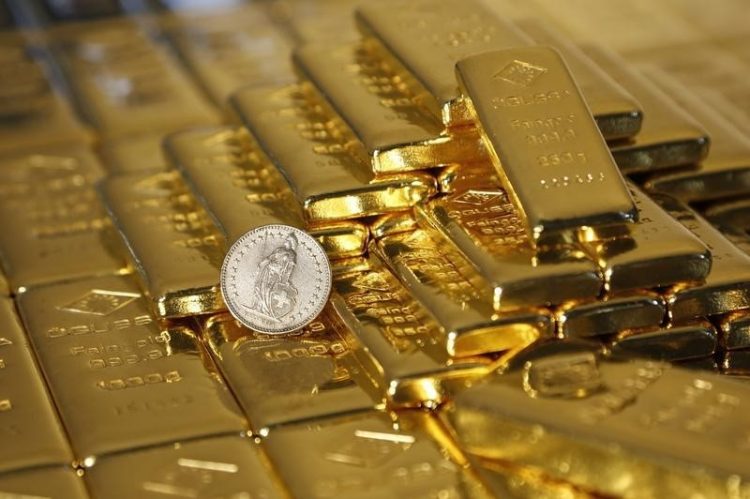 Oro se dirige a la ganancia semanal en medio de ninguna subida de interés Pronóstico