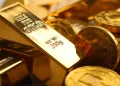 La caída del oro con el aumento del dólar y el enfoque en los datos de inflación en Estados Unidos