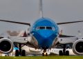 blue and white airplane on airport during daytime