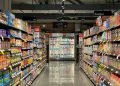 white and red labeled pack on white shelf