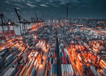 city with high rise buildings during night time